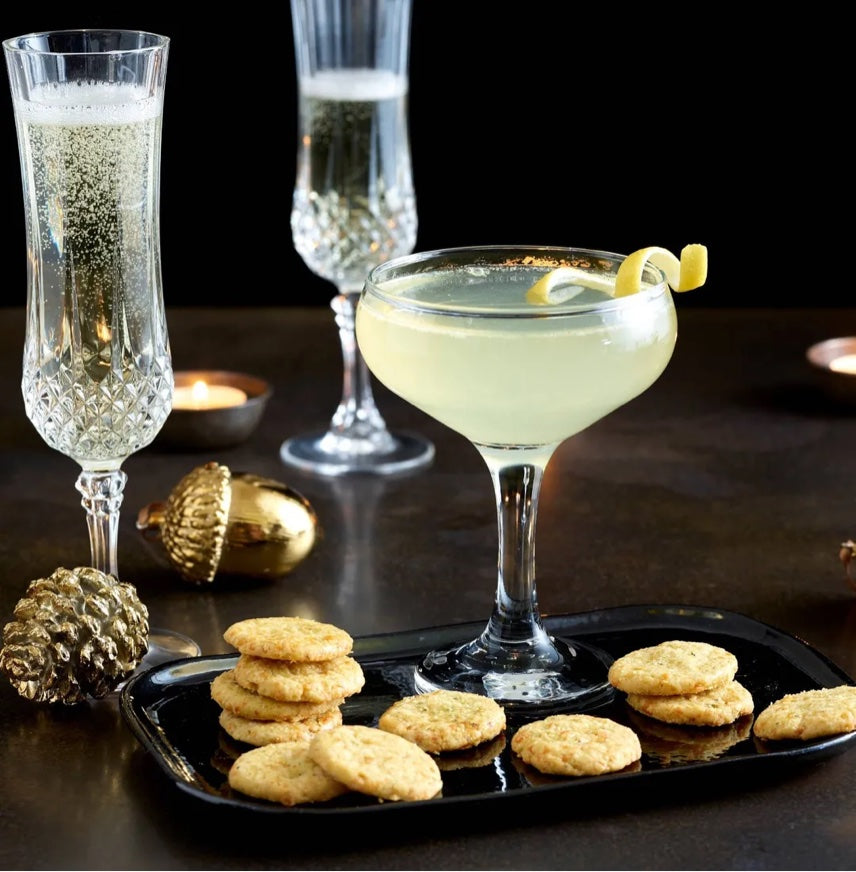 Drinks biscuits served with champagne cocktails