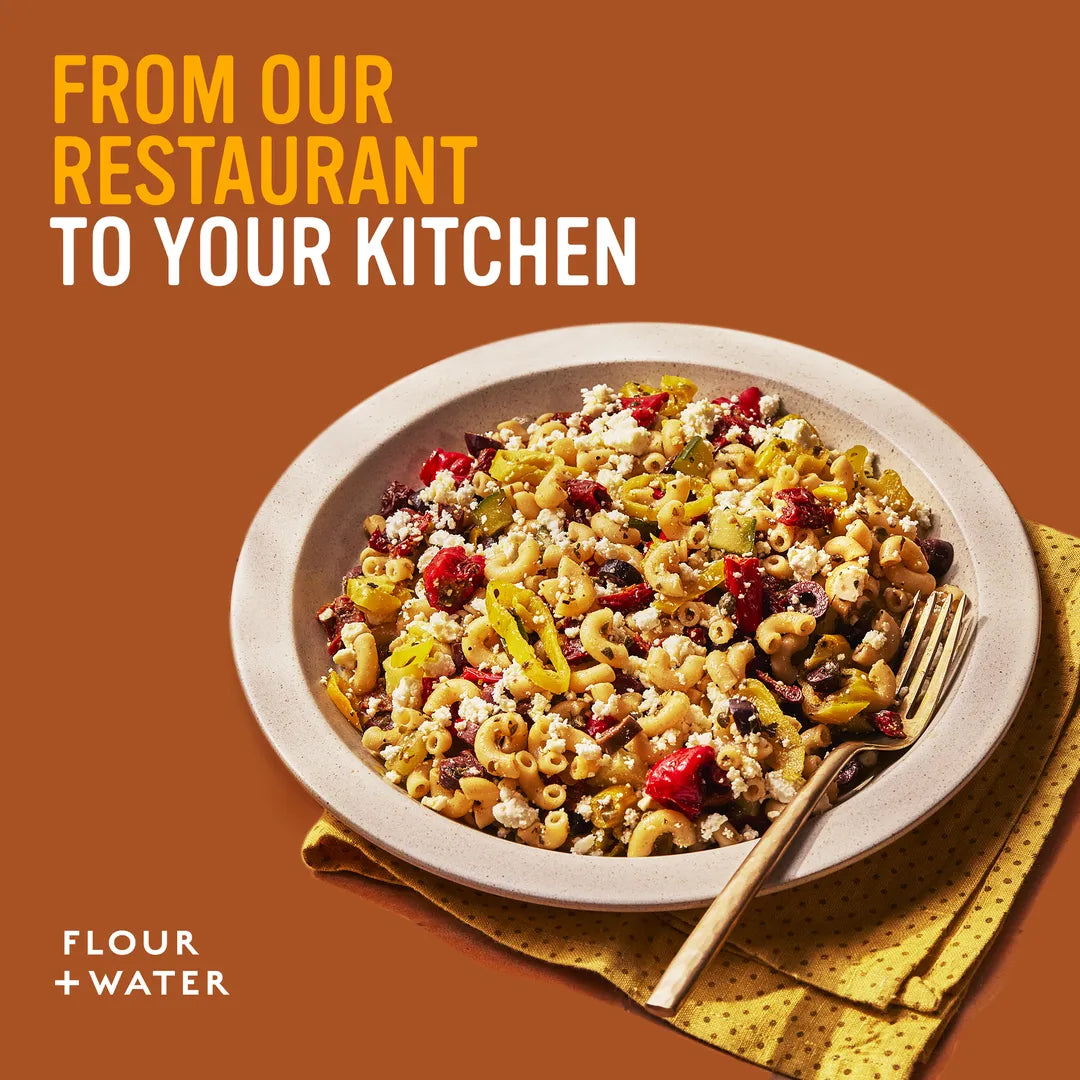 Serving suggestion: Flour + Water elbow macaroni pasta salad with tomatoes, olives and crumbled cheese