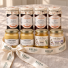 All eight French Table Box jars displayed outside the box with ivory Lello ribbon
