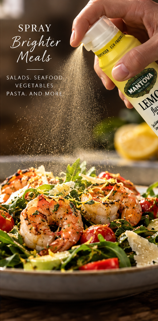 Mantova Sicilian Lemon Extra Virgin Olive Oil Spray misting a shrimp salad